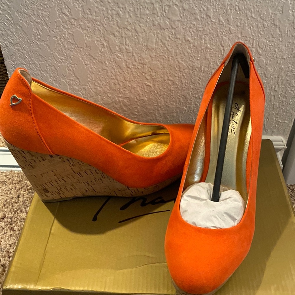 Never worn. Coral / Orange Size 8.5 wedge heels. CUTE!